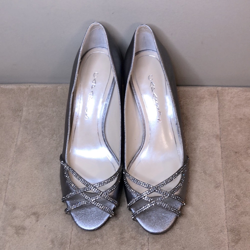 CAPARROS rhinestone pumps
